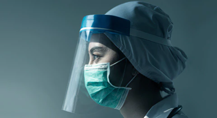 Healthcare worker wearing personal protective equipment.